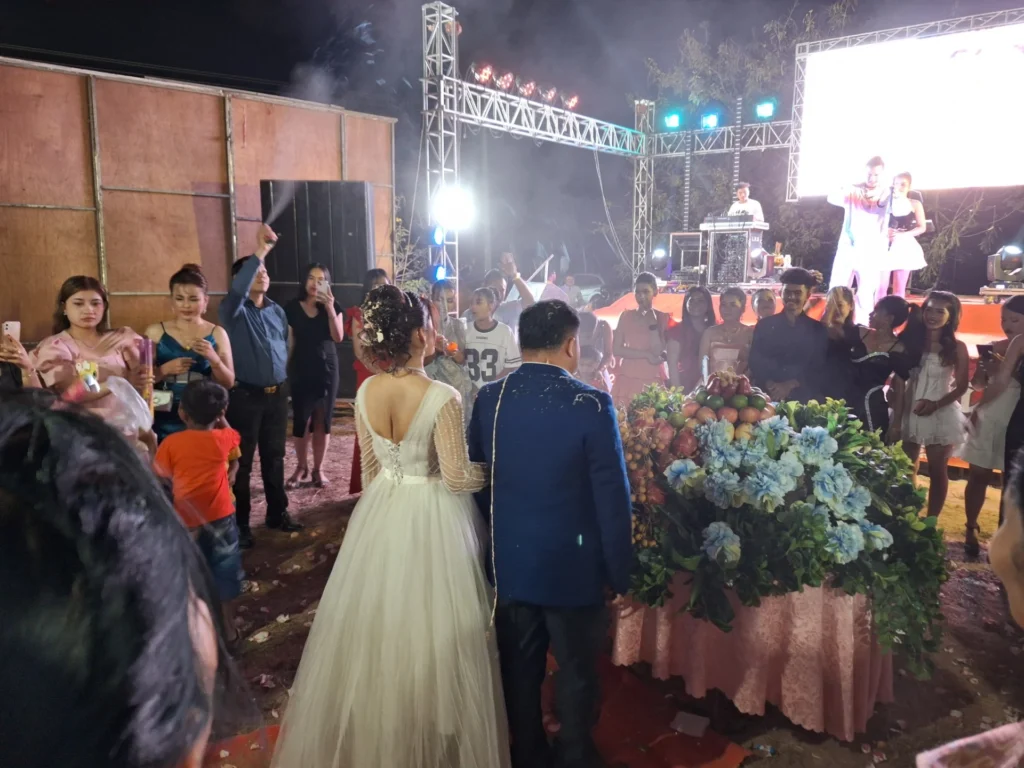 Bride and groom engaging in a traditional dance