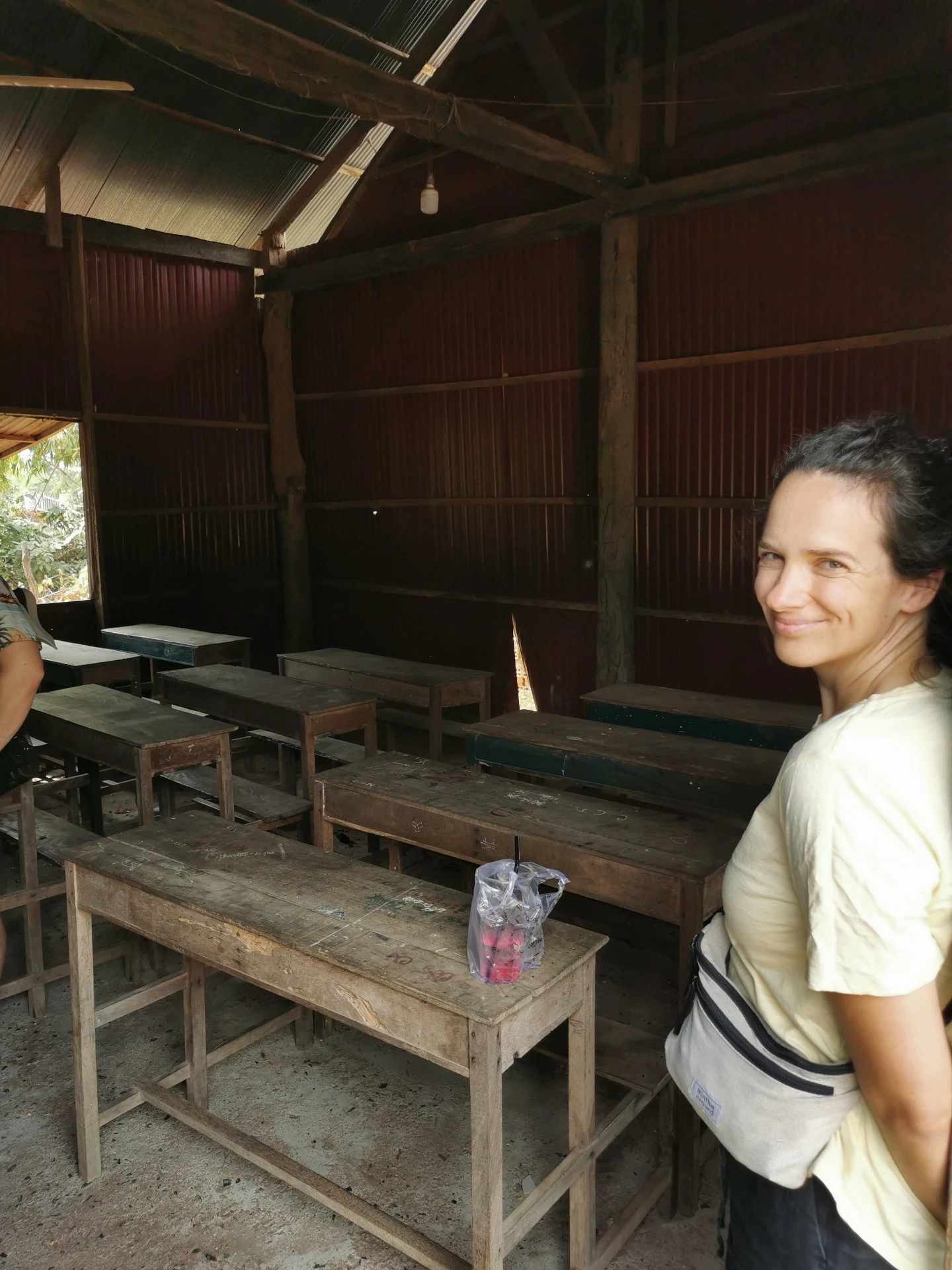 Caro in her classroom waiting for her students' arrival