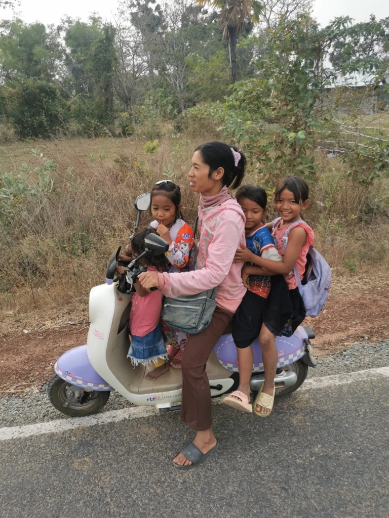 Mom transporting children to school